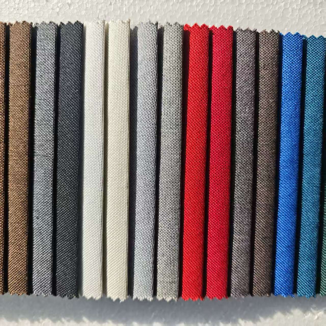 Wholesale 140GSM 100% Polyester Woven Faux Linen Fabric Upholstery Material 42 Color Options for Sofa Pillow and Stuffed Toy