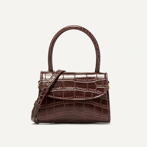 กระเป๋าแฟชั่นผู้หญิงแบรนด์หรู หนัง PU ปี 2025  แบบลำลอง ปิดด้วยกระดุม ความจุ 1-1.9 ลิตร - Product Image 3