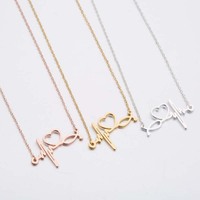 Collier pendentif en acier inoxydable plaqué or rose 18 carats, anti-ternissement, motif ECG, battement de cœur, pour femme