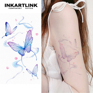 สติกเกอร์ลาย<span class=keywords><strong>สัก</strong></span>ชั่วคราวลายผีเสื้อสีน้ำฟ้า ลายศิลปะร่างกายนางฟ้าสีม่วงในฝัน สำหรับผู้หญิง ขายส่ง ลายสักปลอมกันน้ำ - Product Image 1