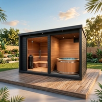 Sauna extérieur trois-en-un : douche, pavillon lounge et baignoire eau chaude/froide, grande sauna.