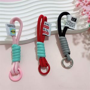 Nouvelle coque de téléphone universelle avec cordon de suspension, porte-clés de voiture, ornements simples, cordon court tressé à la main en nylon pour téléphone, porte-clés promotionnel - Product Image 4