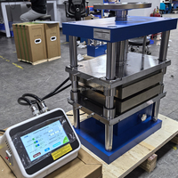 Petite presse à chaud de laboratoire pour le moulage par compression des thermoplastiques à haute température (jusqu'à 300 °C)