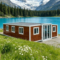 Maison conteneur extensible Voros 40 pieds à double aile, panneaux sandwich, design moderne du milieu du siècle, 2 chambres, caractéristique respirante, 74 m²