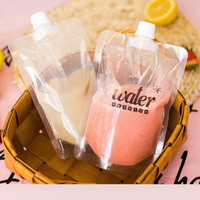 Pochettes souples personnalisées en plastique transparent de 150g avec bec verseur pour café et jus – Sécurité et fraîcheur garanties