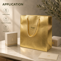 Sac cadeau en papier métallisé doré avec logo personnalisé et poignées en corde pour bijoux, cosmétiques, mariage et emballages de luxe pour la vente au détail