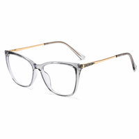 Lunettes de vue œil-de-chat à grande monture en acétate avec branches en métal doré et détails scintillants, style affirmé, vente en gros