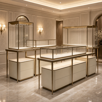 Vitrine à bijoux en acier inoxydable personnalisable avec éclairage LED, écologique et durable, pour les magasins de détail, les musées, la décoration intérieure