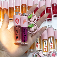 Gloss à lèvres brillant effet miroir coloré avec applicateur jumbo en forme de pied de biche, capuchon blanc sur tube transparent, emballage unisexe