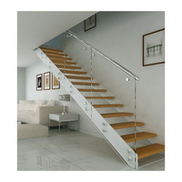 Escalier moderne à double poutre en acier avec balustrade en verre teinté