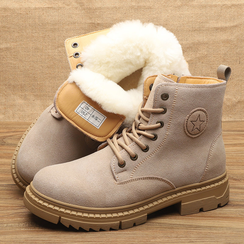 Mid-calf sand-colored wool boots