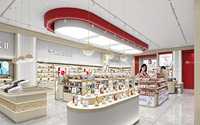 Mobilier de vente de cosmétiques, aménagement ouvert élégant, comptoirs incurvés, étagères intégrées avec éclairage LED pour l'intérieur d'un magasin de cosmétiques coréens haut de gamme