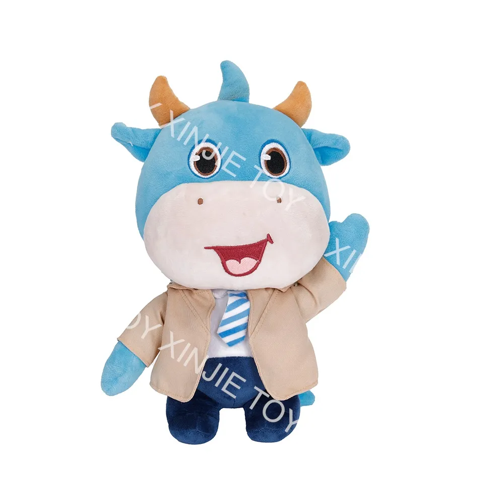 कस्टम कार्टून आलीशान हैलो गाय खिलौना खुबानी कोट धारीदार धनुष टाई के साथ कशीदाकारी कॉर्पोरेट शुभंकर आलीशान गाय खिलौना गतिविधि उपहार