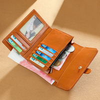 Dompet Kulit Gaya Baru untuk Wanita dengan Lapisan Kulit Bermotif Telapak Tangan
