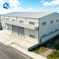 Garage et entrepôt industriels préfabriqués modernes à grande portée en structure acier avec poutre en acier en H solide pour le stockage
