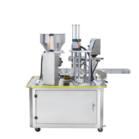 Machine de remplissage et d'emballage rotative de haute précision pour liquides, pâtes, granulés et poudres, pour verres à boisson, avec table de scellage intégrée, modèle très demandé