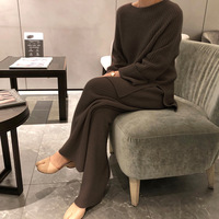 Pull fendu de couleur unie pantalon à jambes larges ensemble deux pièces pour femmes 2024 automne et hiver nouvel ensemble en tricot ample à la mode