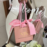 Sacs cadeaux élégants personnalisables avec logo en aluminium Sac à provisions en papier de couleur pour l'artisanat de bijoux et de vêtements avec nœuds à poignée en ruban