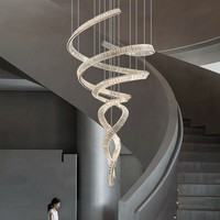 Lustre en cristal de luxe à lumière directe d'usine bambou non standard pour salon hall d'hôtel conception rotative fabriquée