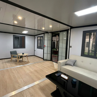 Maison conteneur extensible à double aile, villa pliable, maison préfabriquée portable, toit solaire, porte panoramique en verre