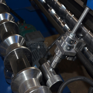 Machine de formage de rouleaux de tuiles métalliques à <span class=keywords><strong>prix</strong></span> d'usine, machine de fabrication de tôles de toiture <span class=keywords><strong>IBR</strong></span> en zinc - Product Image 3