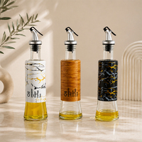 Bouteille Distributrice d'Huile en Verre 300ml avec Bec Verseur en Acier Inoxydable et Coque Décorative en Plastique – Idéale pour l'Huile d'Olive et le Vinaigre en Cuisine et à la Maison