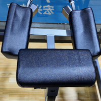 Machine de musculation des fessiers pour la maison avec coussinets d'épaule épais et plateforme de maintien debout pour usage domestique et en club