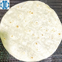 Machine automatique pour la fabrication de tortillas mexicaines à base de farine de maïs.