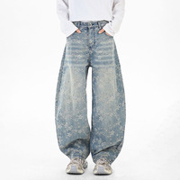 Pantalon ample à jambes larges, pantalon tendance à coupe incurvée, pantalon en jean jacquard tendance à motifs végétaux et floraux