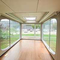 Conteneur préfabriqué en acier Hôtel Péniche Capsule Maison sur l'eau Maison modulaire flottante Petite Maison Logement mobile