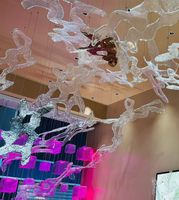 Lustres suspendus de luxe en forme d'éclosion d'art, éclairages décoratifs faits à la main en forme de glace pour escaliers et halls