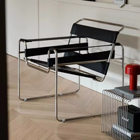 Fauteuil de salon en cuir noir de haute qualité au design minimaliste scandinave du milieu du siècle avec structure en acier inoxydable