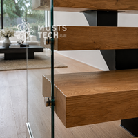 Escalier mono-à-capitère sur mesure, design architectural minimaliste intérieur, fabrication professionnelle et ingénierie