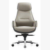 Chaise de bureau ergonomique pivotante en cuir PU pour la maison, vente en gros, pieds en acier inoxydable, chaise de jeu inclinable confortable avec repose-pieds