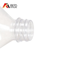 Bouteille en plastique PET de 900 ml de qualité alimentaire jetable pour boissons (thé, soda, eau minérale) avec bouchon inviolable