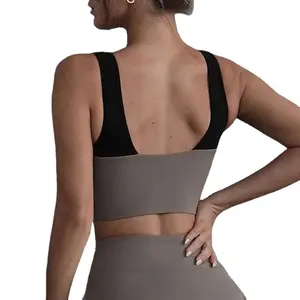 Conjunto de sutiã esportivo de retalhos para mulheres, sutiã personalizado de alta qualidade com duas peças para ioga e fitness, saia de cintura alta e saia combinando