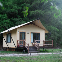 Tienda de lona Glamping de dos pisos, revestimiento aislado de estilo nómada, marco de acero opcional, tela Oxford de 7m de PVC para exposiciones al aire libre
