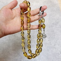 Großhandel: Wunderschöne farbige Harz-Bernstein-Misbaha (oval, 10*15mm) mit 33 Perlen, islamischer Tasbih für Muslime, mit Silberquaste