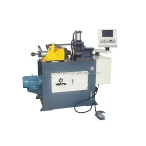 Tube punching machine