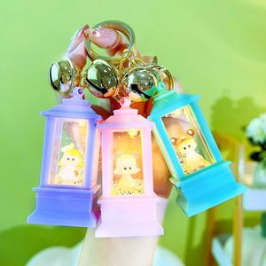 Creative Small LED Light Quicksand Oil Lighthouse Oil <b>Key</b> <b>Chains</b> with Light Bag Pendant Acrylic Lighthouse Liquid Keychain - Product Image 2