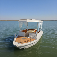 Nouveauté : Bateau électrique de loisirs pour l'extérieur avec auvent et table, idéal pour les fêtes aquatiques et les rassemblements familiaux sur le lac