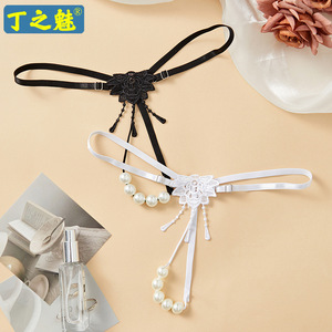 Tanga de perlas para mujer Ding Zhi Mei, accesorio íntimo sexy en blanco y negro para parejas - Product Image 1