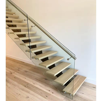 Escalier flottant droit en bois massif et acier pour intérieur, style industriel, marches fermées en métal, éclairage LED, verre, moderne, pour hôtel et villa