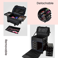 Valise de maquillage professionnelle noire à roulettes avec compartiment supérieur amovible 2 en 1, en nylon, avec roulettes