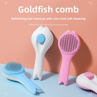 Brosse démêlante manuelle auto-nettoyante en forme de poisson, outil d'élimination des poils en un clic pour chats, chiens et toilettage des animaux de compagnie