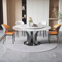 Ensemble table et chaises de salle à manger modernes et minimalistes avec plateau en pierre brillante ; Table à manger pivotante compacte pour petites maisons, au design élégant