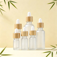 Flacon compte-gouttes en verre givré avec couvercle en bambou, emballage écologique pour soins de la peau, pour sérum et essence