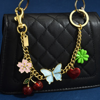 Porte-sac en chaîne métallique DIY à coudre, motif cerise, papillon, cœur, et porte-clés double couleur motif papillon et fleur