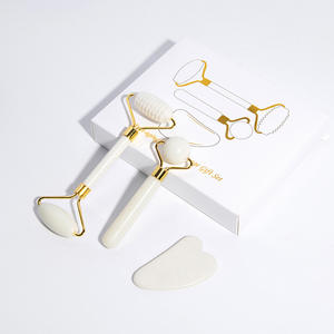 Vente en gros <span class=keywords><strong>Pierre</strong></span> <span class=keywords><strong>de</strong></span> <span class=keywords><strong>jade</strong></span> naturelle Visage Beauté Anti-âge Ensemble Rouleau <span class=keywords><strong>de</strong></span> <span class=keywords><strong>jade</strong></span> blanc Gua Sha Outil pour Massage du visage - Product Image 3