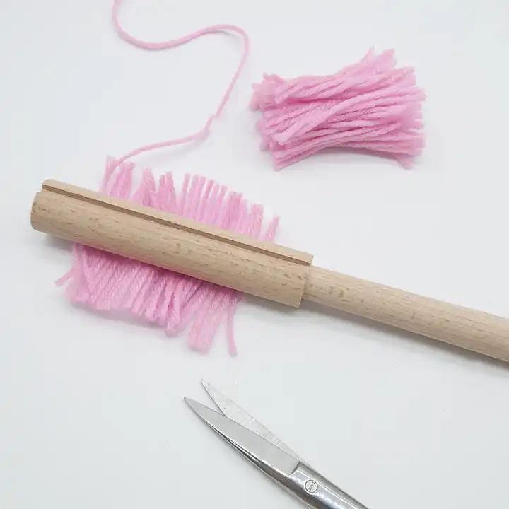 crochet yarn cutter and wooden bent